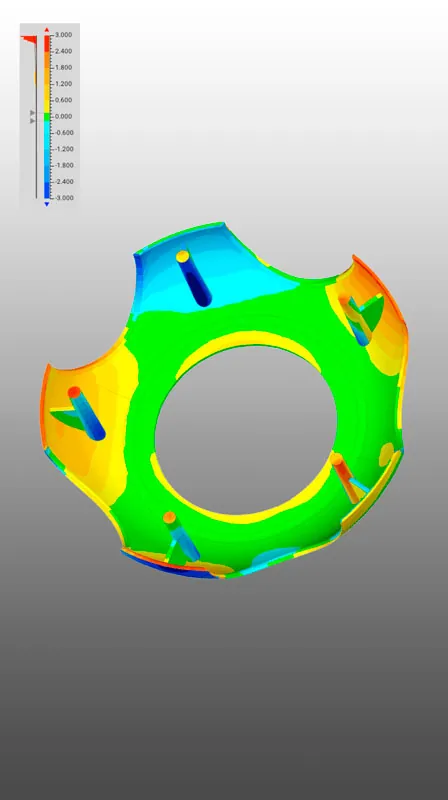 Visualización de mediciones de alta precisión realizadas en un componente metálico usando tecnología de escaneo 3D.